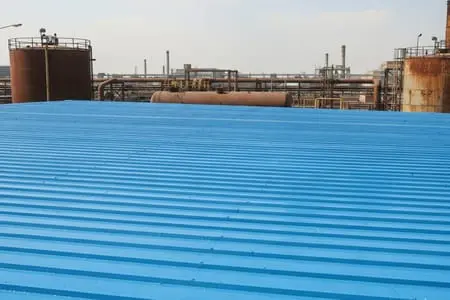 Metal roof protected with polyurethane coating after waterproofing service in Pakistan