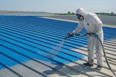 Polyurea spray coating waterproofing system applied on industrial roof for seamless protection